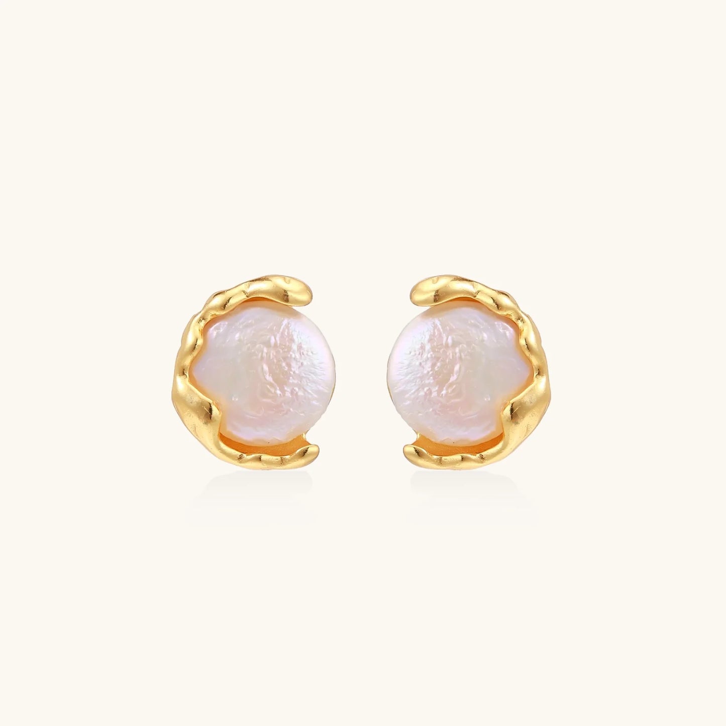 Gold vermeil studs with lustrous pink freshwater pearls in organic crescent settings