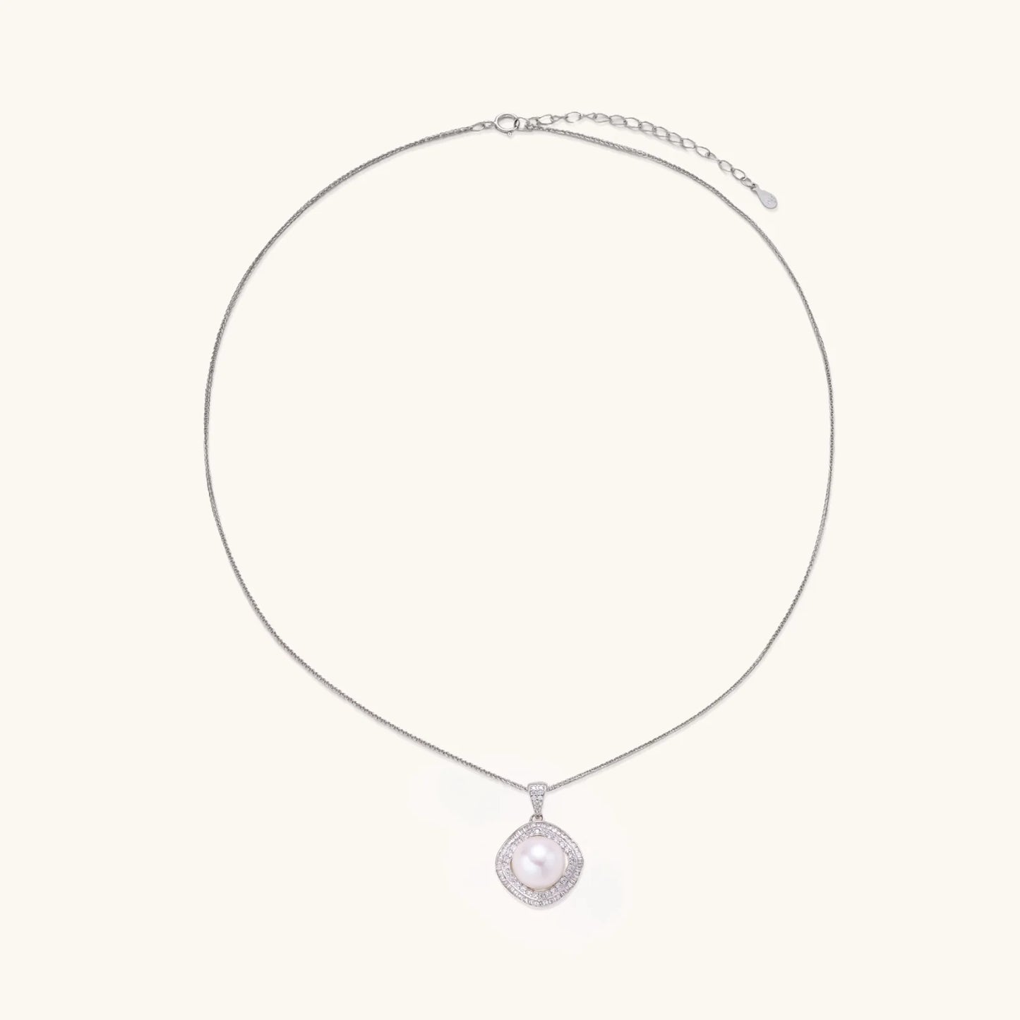 Cushion-shaped double halo pendant with 10mm freshwater pearl center on rhodium-plated sterling silver chain