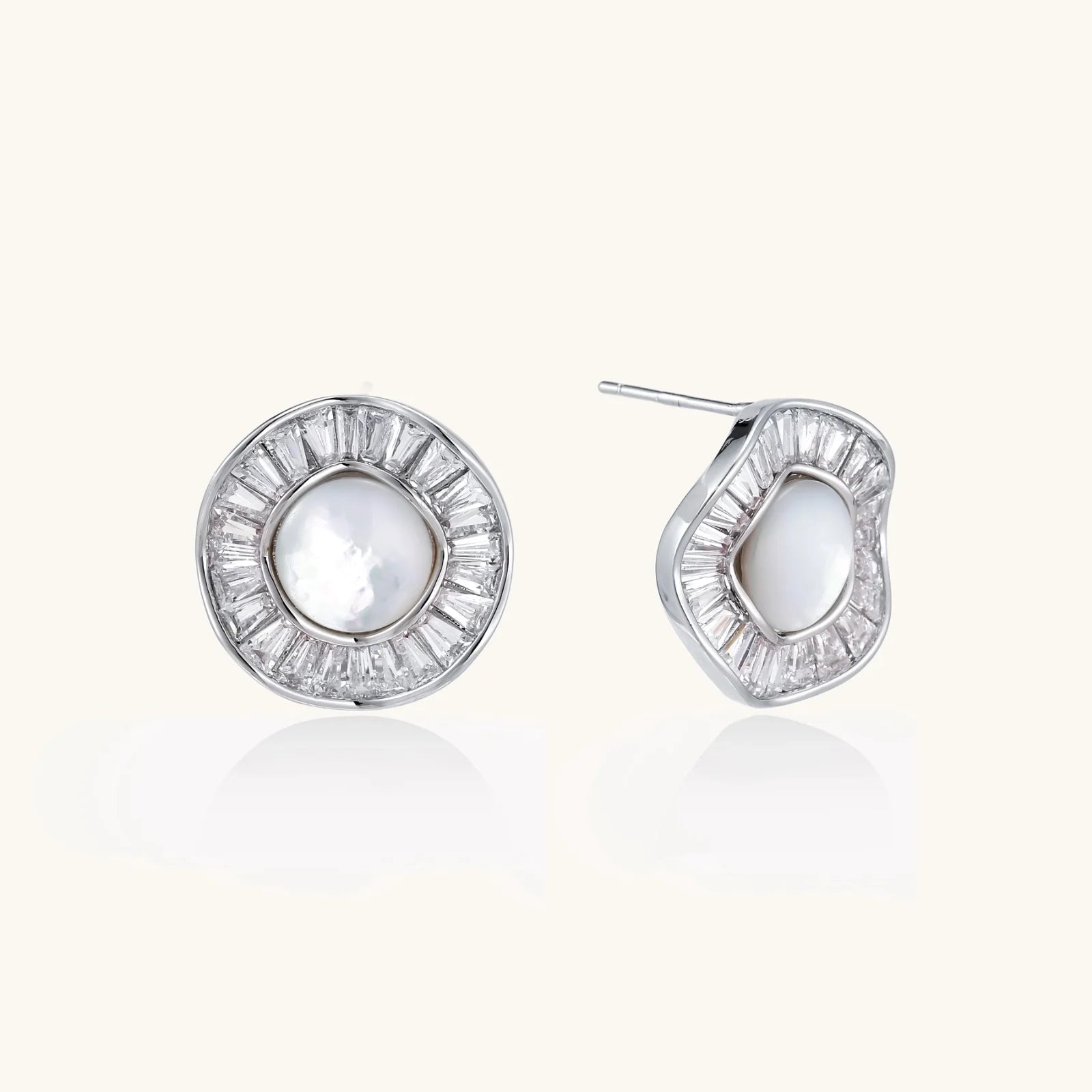 14K gold-plated stud earrings with freshwater pearl center surrounded by baguette-cut crystal halo in sunburst design