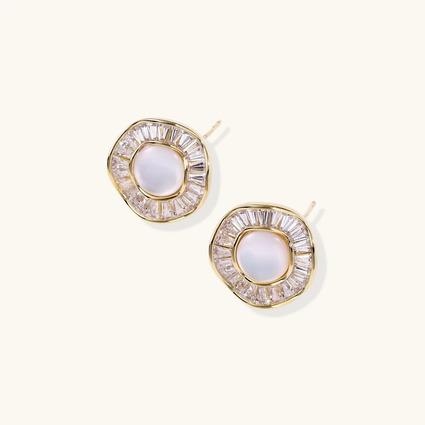 14K gold-plated stud earrings with freshwater pearl center surrounded by baguette-cut crystal halo in sunburst design